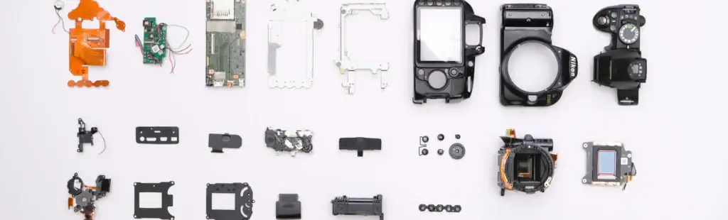 Insert-molded components with precision metal inserts